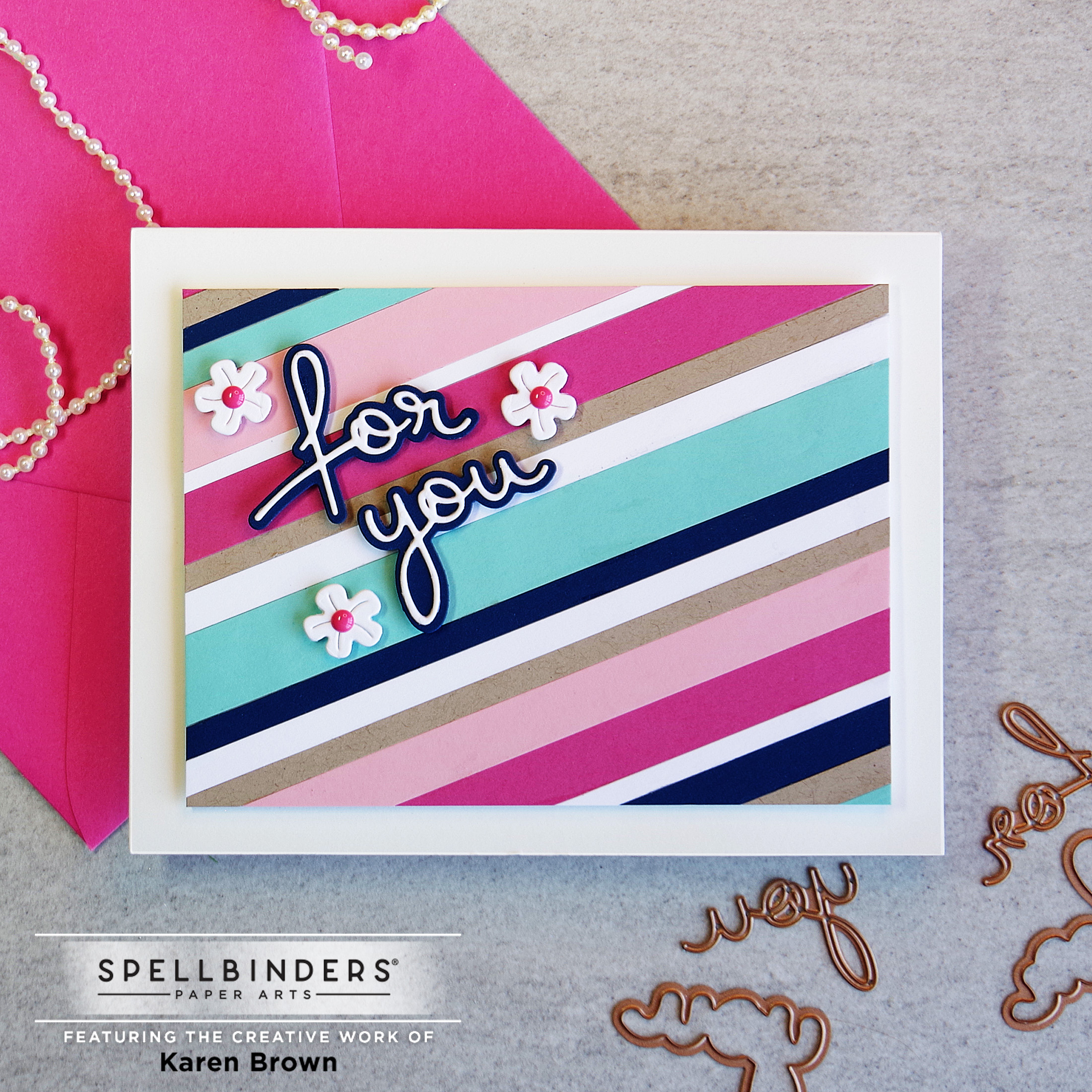 Handmade card with background made of strips of colored cardstock.