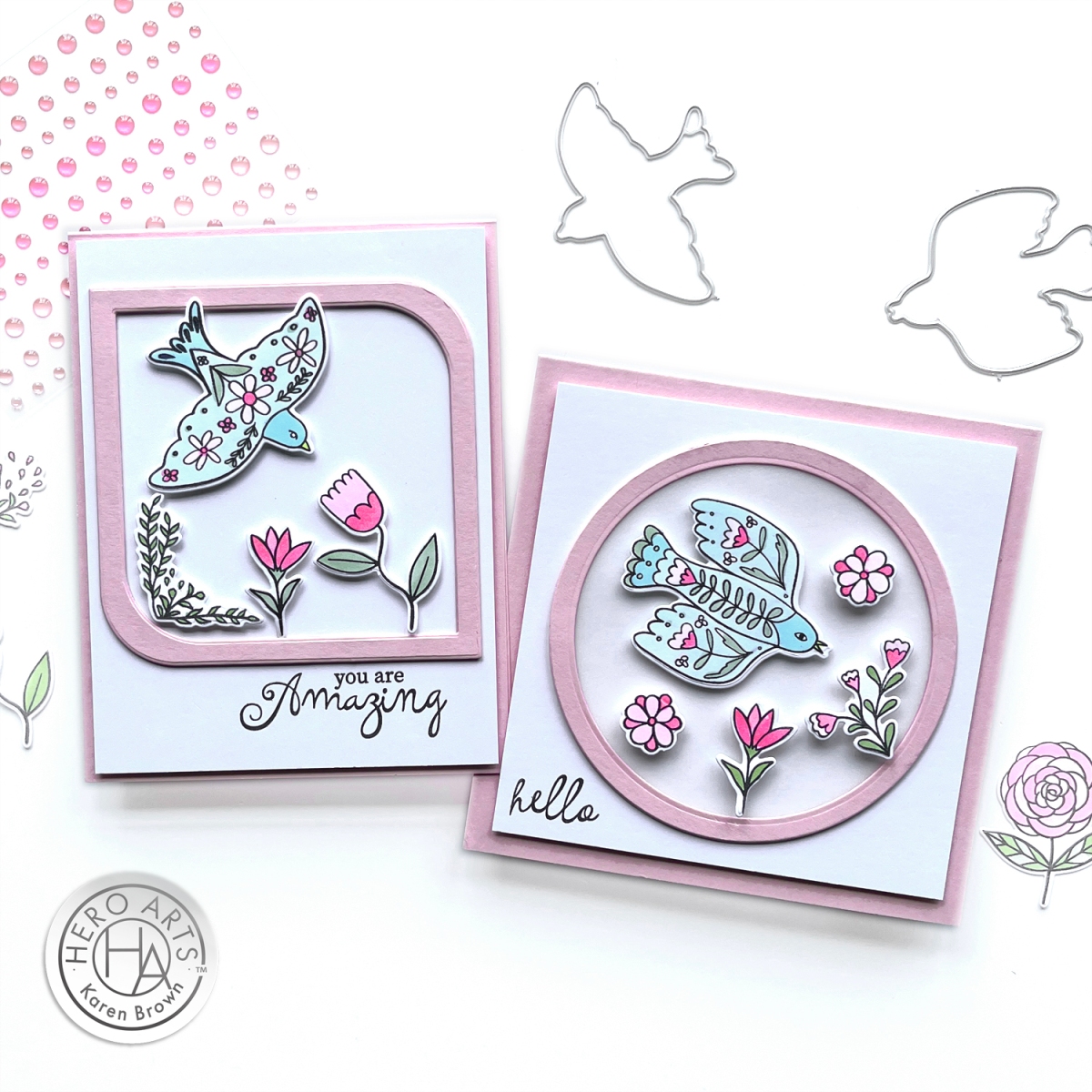 2 floral bird scene cards framed with infinity die cut frames in a pink, blue and white color scheme.