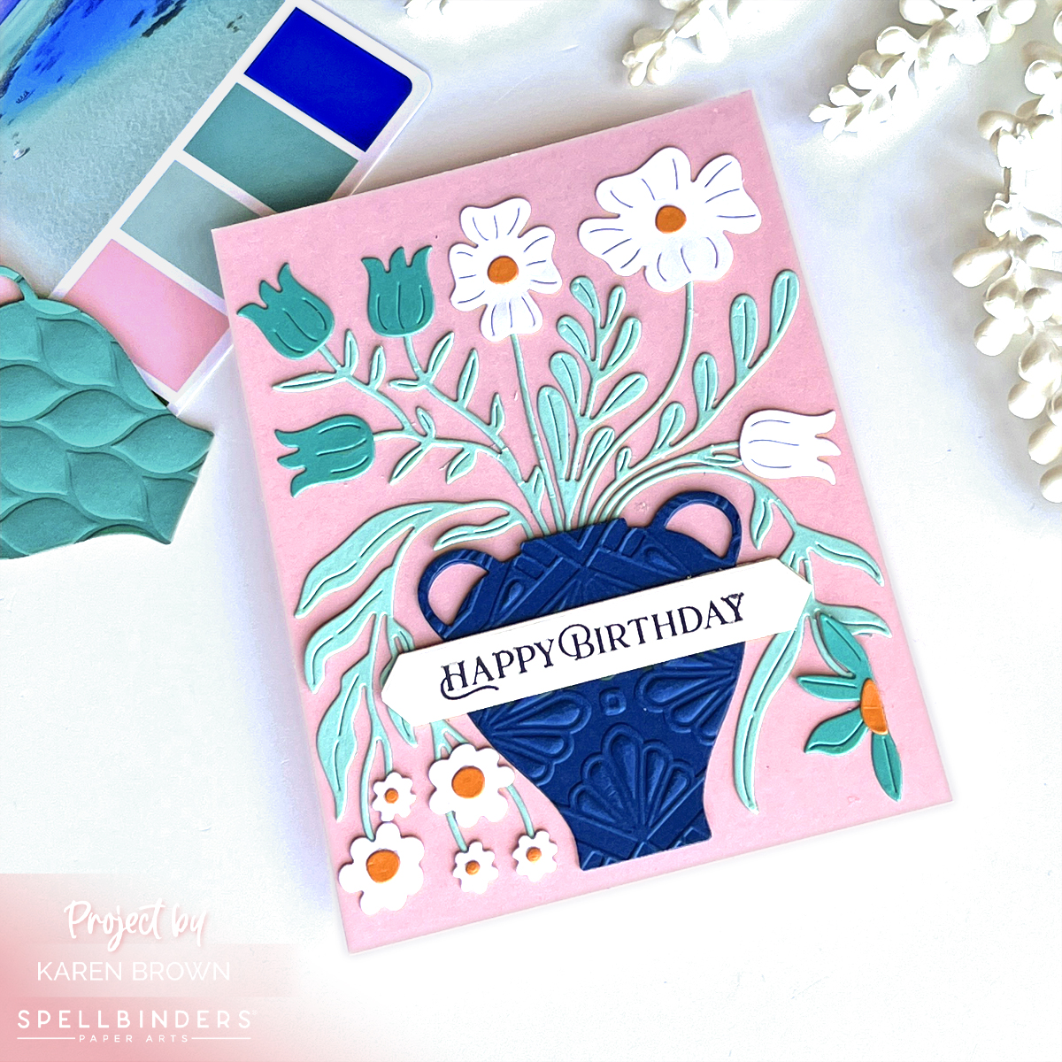 Pink, Aqua, Turquoise, Blue and White Floral die cut Birthday card with flowers in an embossed vase.